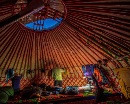 Skiers inside a yurt in Kyrgyzstan