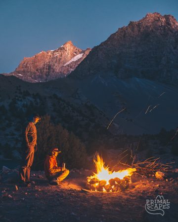 Sitting by a campfire in the Fann mountains, Tajikistan